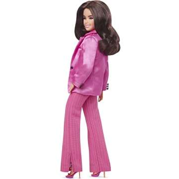 Barbie The Movie Doll, Gloria Collectible Wearing Three-Piece Pink Power Pantsuit with Strappy Heels & Golden Earrings
