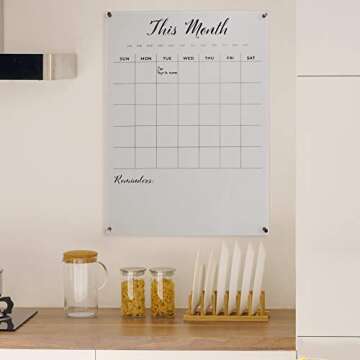 Large, clear, monthly Acrylic calendar for wall with Rose Gold mounting hardware. 23" x 31" x 0.2" wall mounted dry erase calendar.