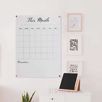 Large, clear, monthly Acrylic calendar for wall with Rose Gold mounting hardware. 23" x 31" x 0.2" wall mounted dry erase calendar.