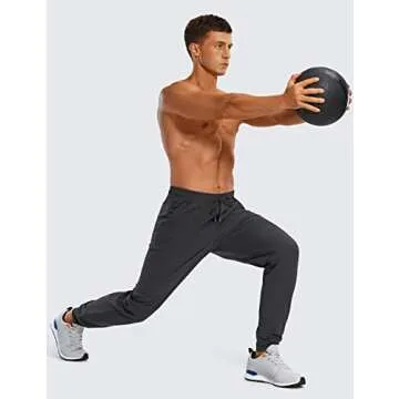 CRZ YOGA Athletic Joggers for Men 29" Lightweight Water Resistant Outdoor Workout Pants with Zip Pockets Ink Gray Medium