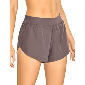 CRZ YOGA Women's Mid Rise Dolphin Running Shorts Quick Dry Lightweight Split Liner Breathable Athlet...