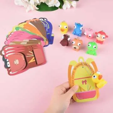 NUJOVI 28 Piece Valentines Day Gifts for Kids with Squeezable Pop-Eye Animal Keychain Ideal for Valentines Day Cards for Kids School, Kids Valentines Day Cards, Valentines Day Gifts for Kids Classroom