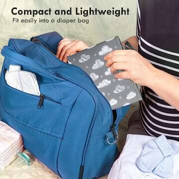 Portable Diaper Changing Pad for Baby - Waterproof Compact Changing Mat with Wrist Strap - Wipeable Travel Changing Pad for Diaper Bag - Gifts for Baby Shower by PHOEBUS BABY(Doodle Clouds)