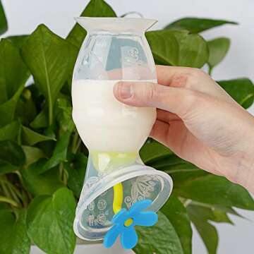 haakaa Manual Breast Pump Breastfeeding Pump Silicone Pump Milk Saver with Suction Base and Flower Stopper 100% Food Grade Silicone BPA Free (5oz/150ml) (Blue)