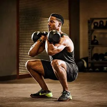 Kettlebell Kings 70lb Cast Iron Weight - Powder Coated Kettle Bell for Strength Training for Men and Women - Durable Gym Equipment for Home Workouts - Easy Grip Handle