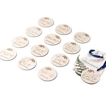 Linen Perch Monthly Milestone Discs- Wooden Milestone Cards - Newborn Baby Monthly Photo Props - Birth Announcement - Set of 13 Engraved Discs (4" Diameter) - Linen Gift Bag (English)