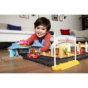 Mattel Disney and Pixar Cars On The Road Playset with 2 Toy Vehicles & Light-Up Countdown, Includes ...