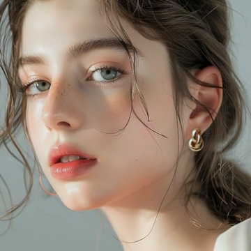 Frigotine Chunky Gold Twisted Knot Stud Earrings