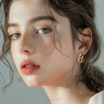 Frigotine Chunky Gold Twisted Knot Stud Earrings