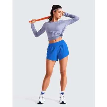 CRZ YOGA Mid Waisted Dolphin Athletic Shorts for Women 4" Lightweight High Split for Gym Workout with Liner Quick Dry Sparkle Blue XX-Small