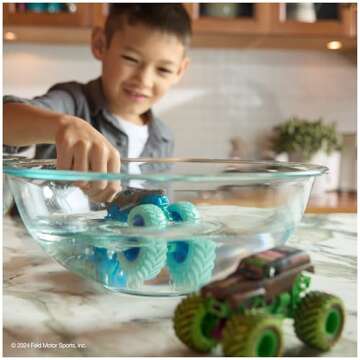 Monster Jam Mud Blasters Color Changing Trucks 2-Pack – Grave Digger and Megalodon Die-Cast Toys