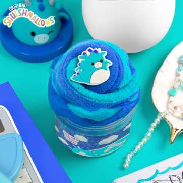 Original Squishmallows Tatiana The Dragon Premium Cloud Slime, 8 oz. Fluffy Slime, Blue Raspberry Scented, 3 Fun Slime Add Ins, Pre-Made Slime for Kids, Great 6 Year Old Toys, Super Soft Sludge Toy