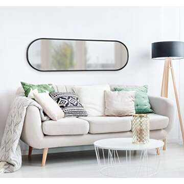 Kate and Laurel Caskill Modern Oval Mirror, 16" x 48", Black, Capsule-Shaped Accent Mirror for Entryway, Living Room, or Bathroom
