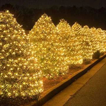 Abkshine 180 LED Solar Christmas Net Lights 10Ft x 4.9Ft, 8 Modes Solar Christmas Bush Lights, Waterproof Outdoor Solar Christmas Lights for Christmas Tree Bushes Garden Yard Fence Wall, Warm White