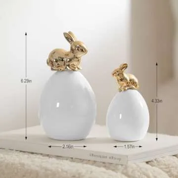 DN DECONATION Easter Bunny Decorations, 2 Pcs Cute Gold Rabbit Sit on White Eggs Figurines for Spring Indoor Home Decor, Porcelain Rabbit Statues Table Centerpiece Mantel Tray Decor Gift
