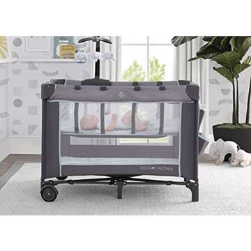 Delta Children LX Deluxe Play Yard With Bassinet and Changing Table
