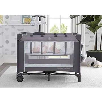 Delta Children LX Deluxe Play Yard With Bassinet and Changing Table