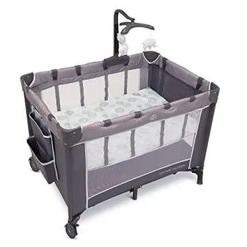 Delta Children LX Deluxe Play Yard With Bassinet and Changing Table