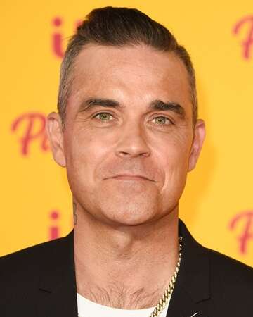 Robbie Williams' Solo Debut: Life thru a Lens