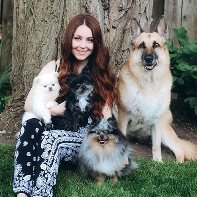 Girl With The Dogs